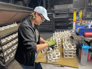LeClaire Manufacturing employee working on cores for use in the casting process.